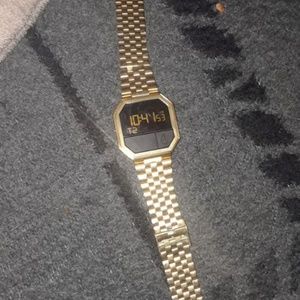 Gold Nixon watch